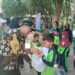Bakti Sosial, SDN 013 Penajam Bagikan 500 Porsi Makanan Bergizi Untuk Warga